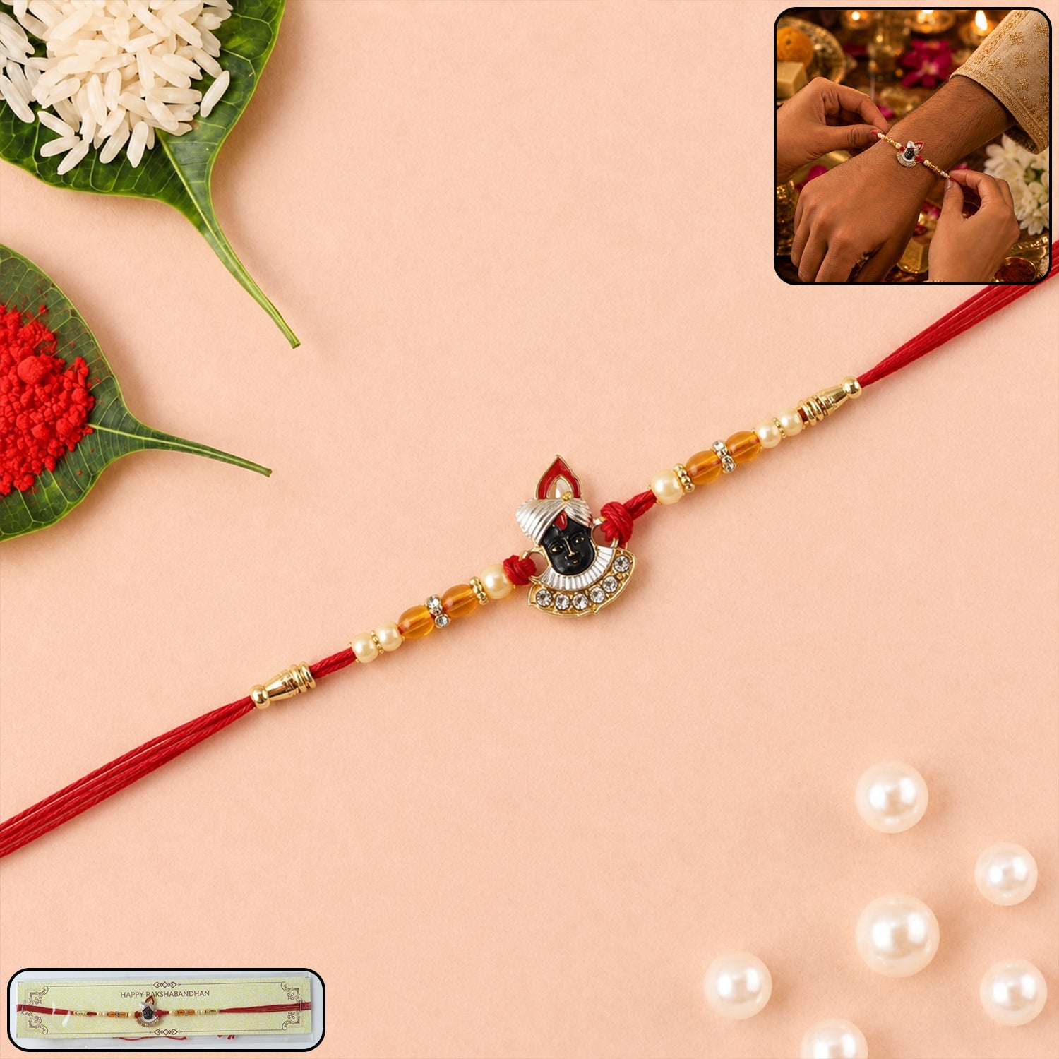 Shrinathji Designer Rakhi with pearl beads and red thread close-up