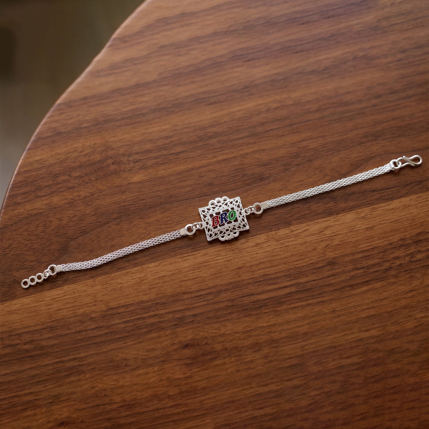 Silver Bro Rakhi with Designer Square Frame (1 Pc)