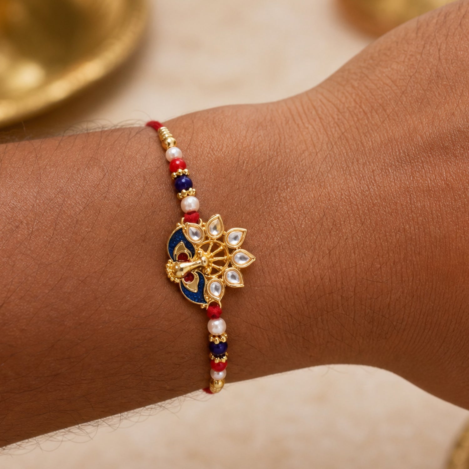 Peacock Designer Rakhi with Pearl Beads and Red Thread (1 Pc)