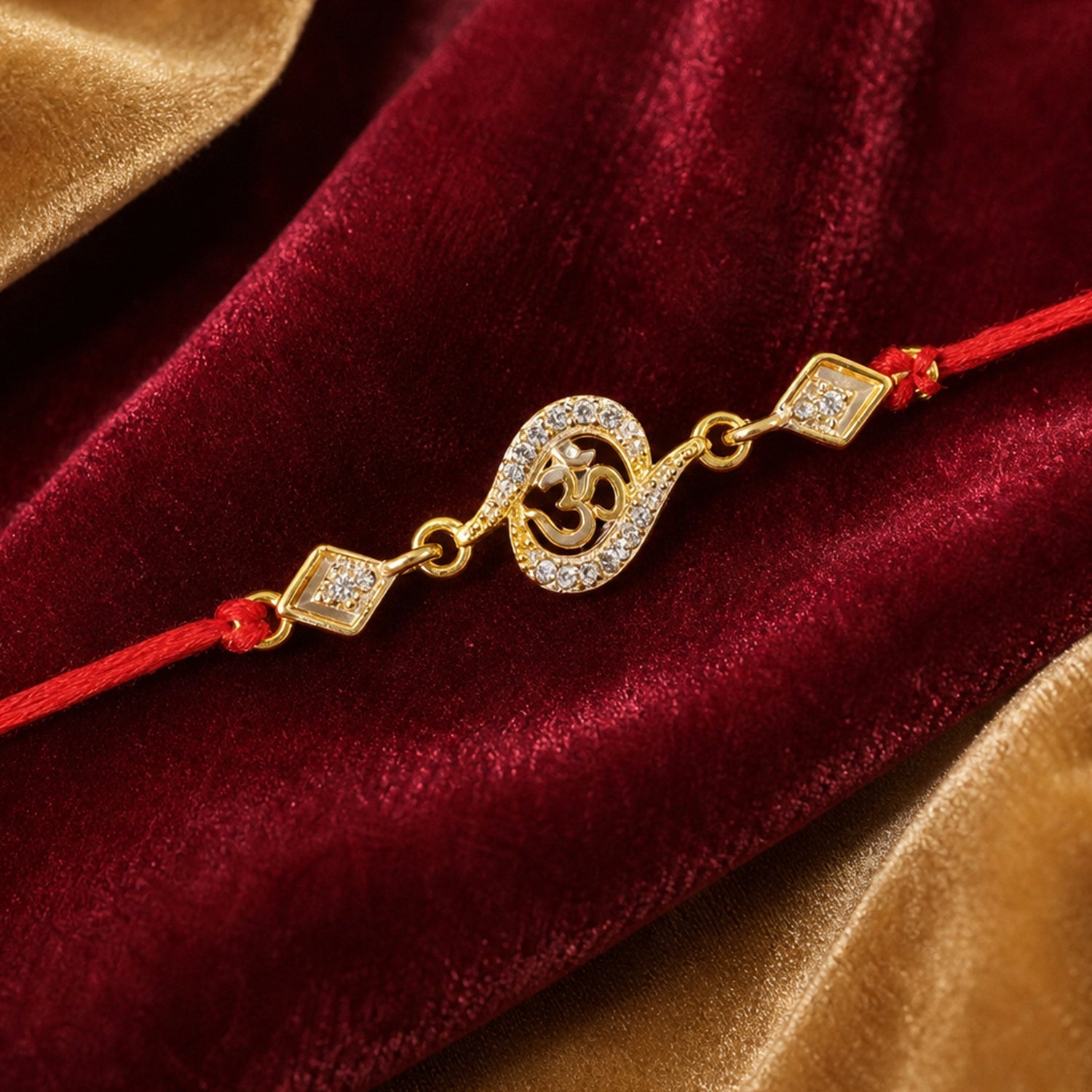 Golden Om Designer Rakhi with Stone Work and Red Thread (1 Pc)