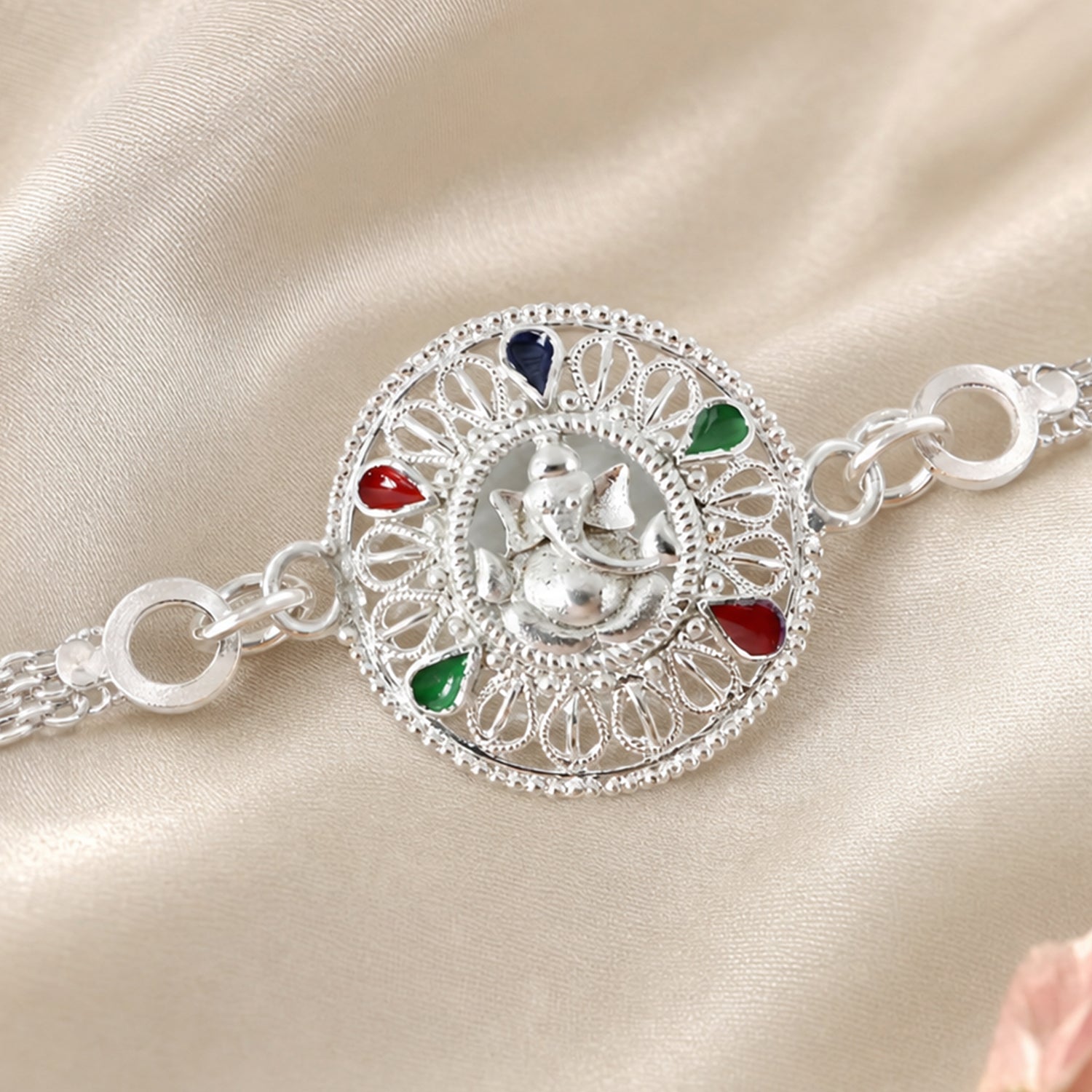 Silver Ganesh Chain Rakhi close up on Ganesh motif