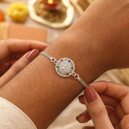 Silver Ganesh Chain Rakhi showing designer motif detail