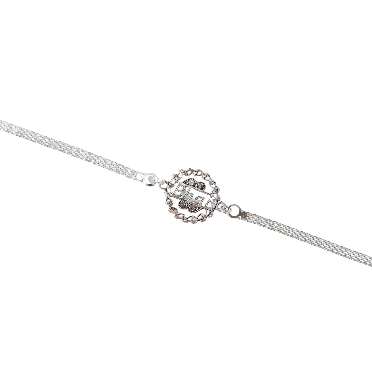 Silver rakhi worn on wrist, showing design