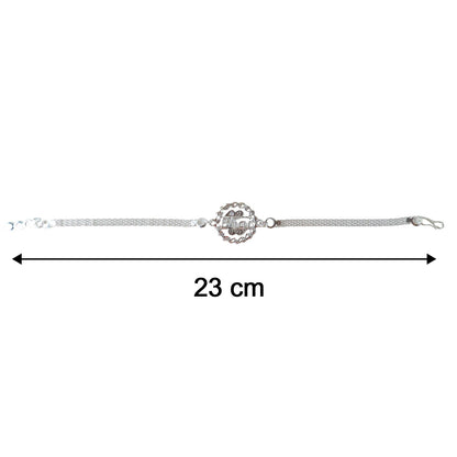 Side view of silver rakhi round charm detail