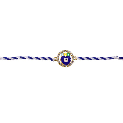 Blue evil eye rakhi tied with traditional dori string