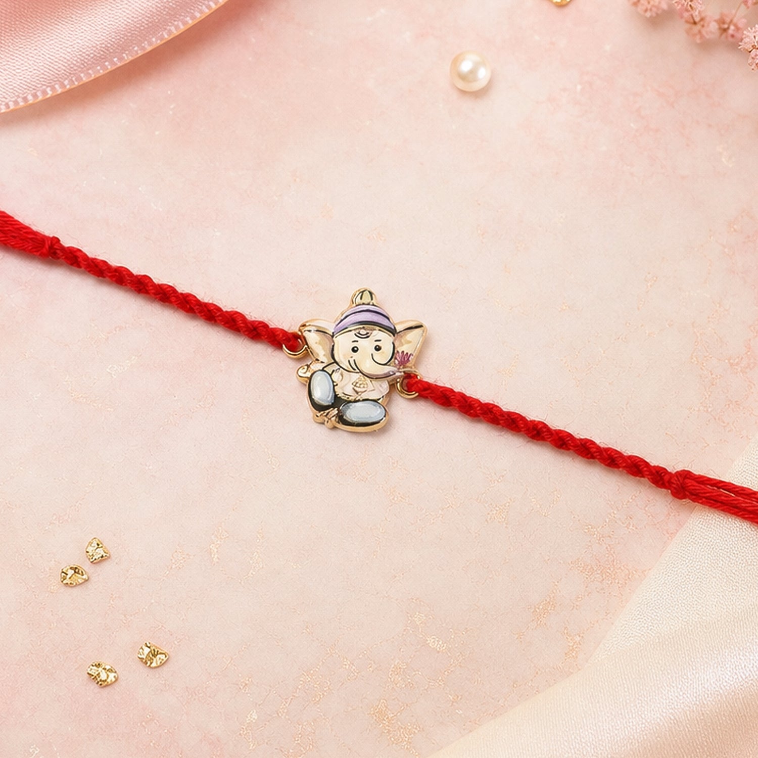 Side view of Ganesh design fancy dori rakhi