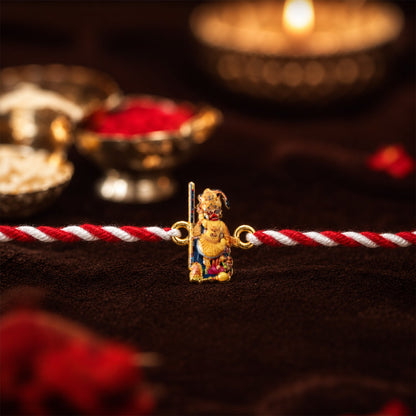 Hanuman Ji fancy dori rakhi displayed on festive cloth