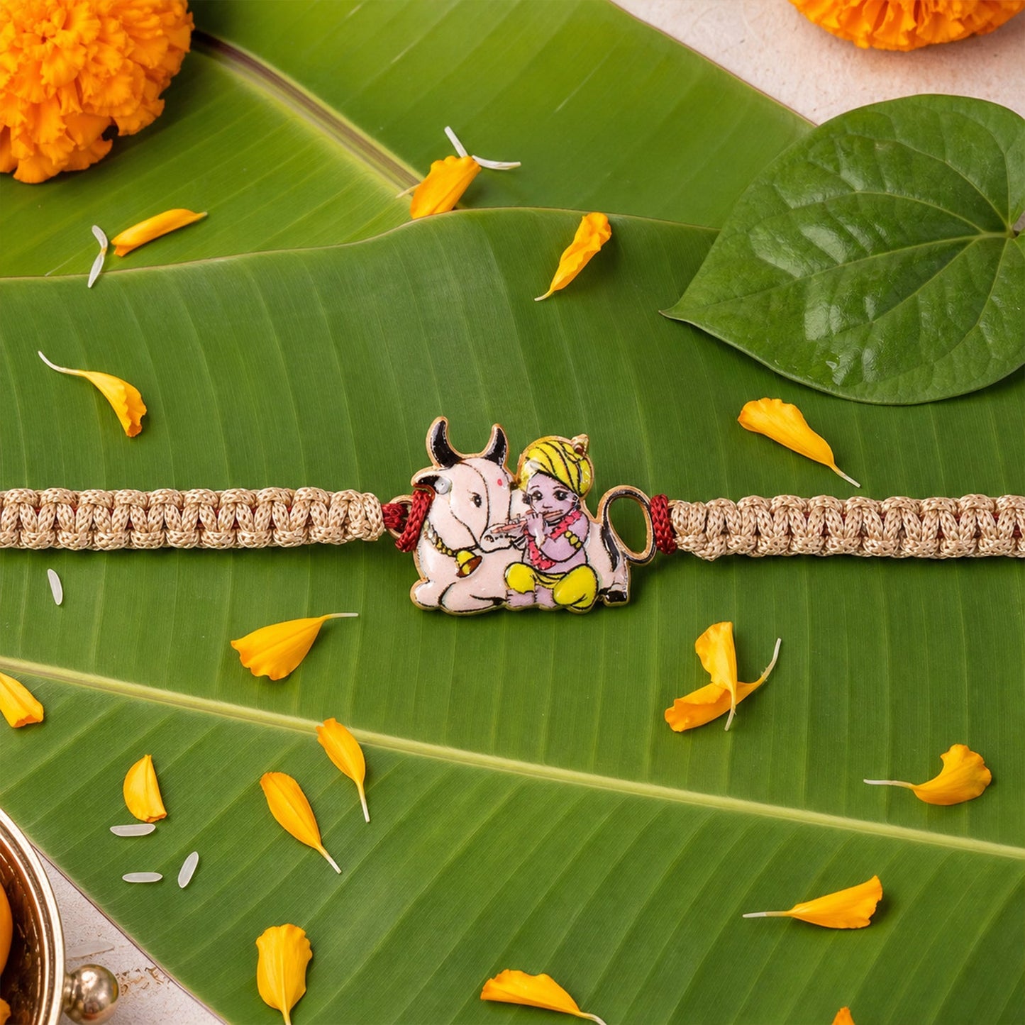 Krishna with Cow Fancy Dori Rakhi tied with decorative threads