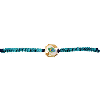 Peacock Feather Fancy Dori Rakhi Displayed on White Background