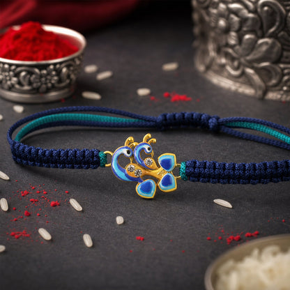 Close-up of peacock motif on Fancy Dori Rakhi