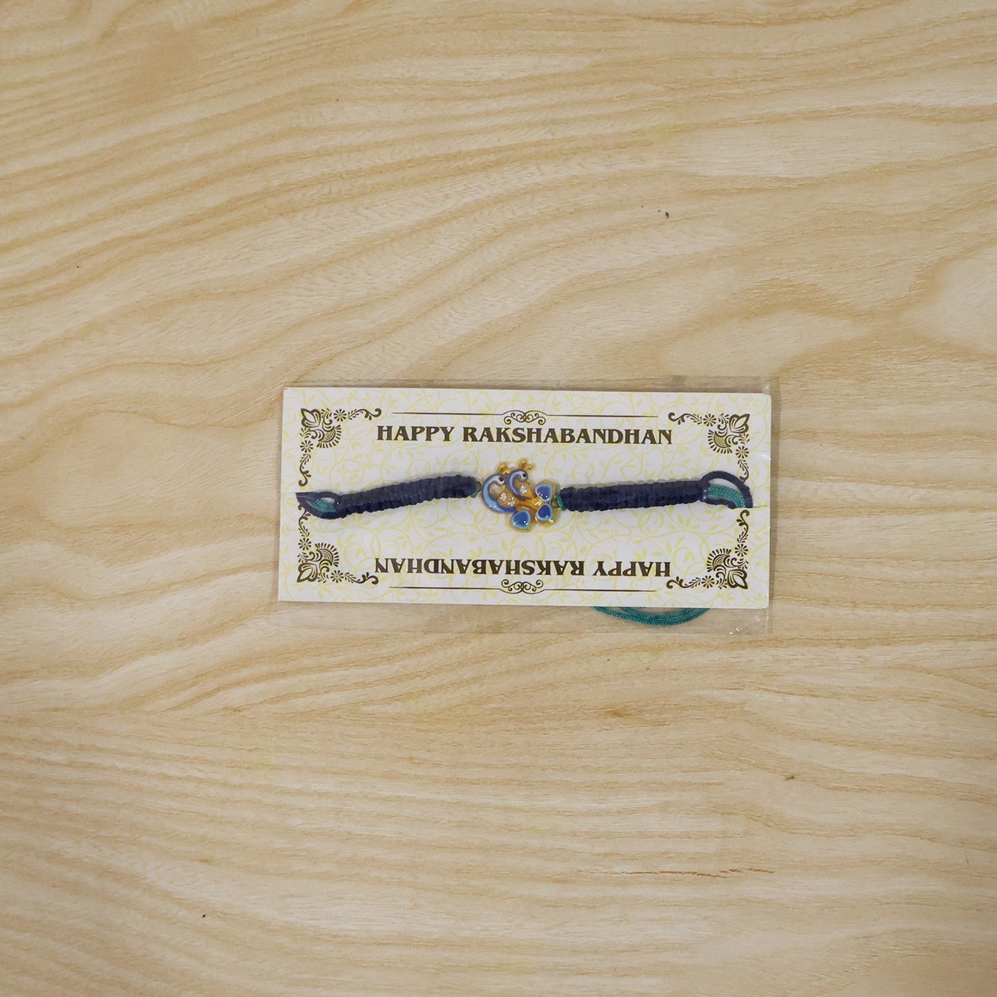Packaging of Peacock Design Fancy Dori Rakhi