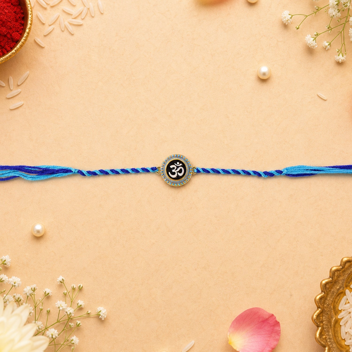 Blue Om Symbol Fancy Dori Rakhi for Brother (1 Pc)