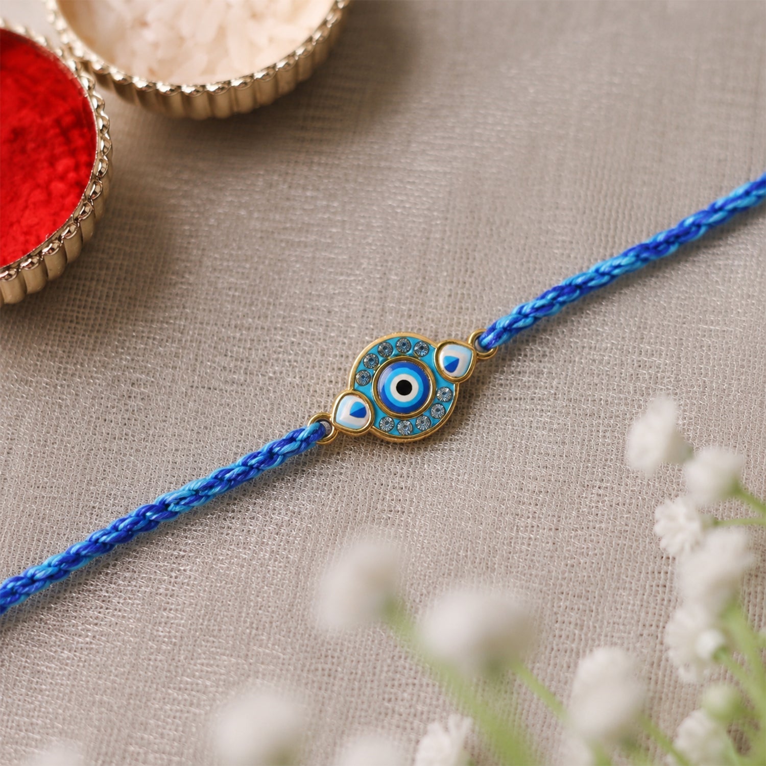 Round Blue Evil Eye Fancy Dori Rakhi for Brother (1 Pc)