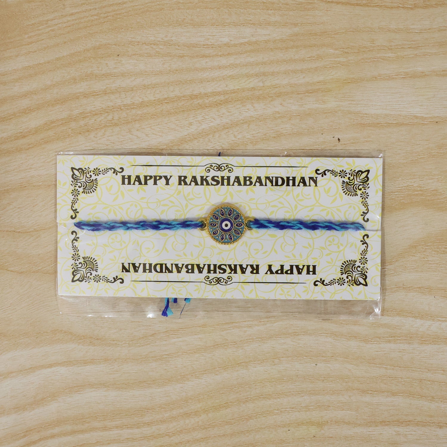 Blue Evil Eye Round Fancy Dori Rakhi for Brother (1 Pc)