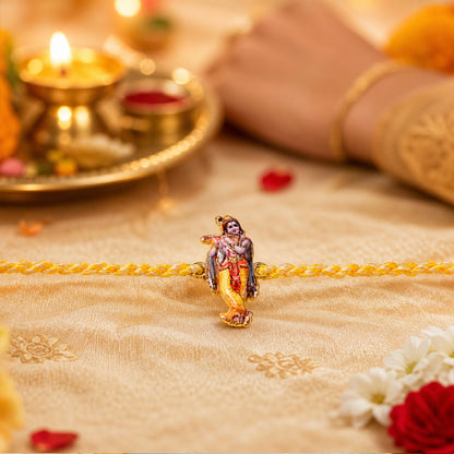 Close-up of Krishna Flute Charm on Fancy Dori Rakhi