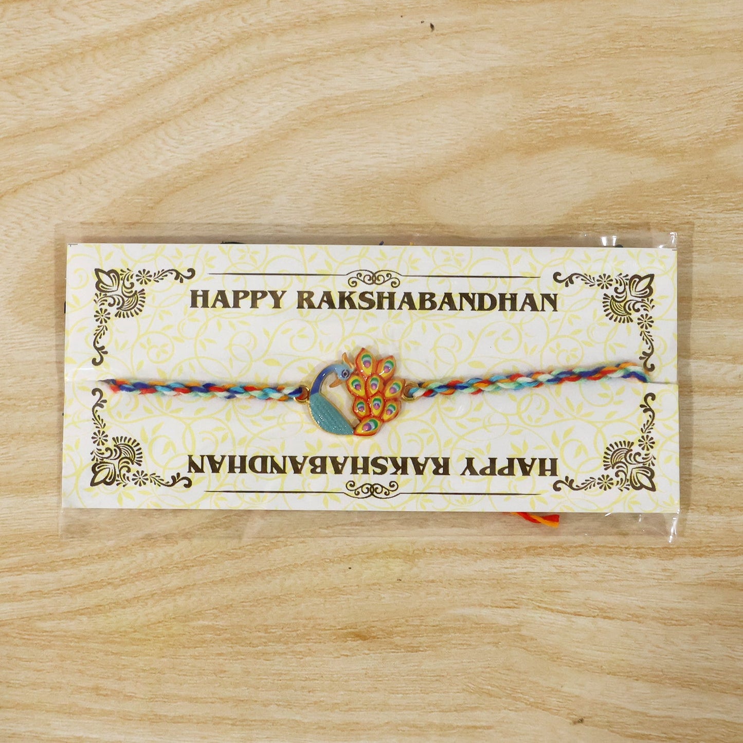 Bright and colorful Peacock Fancy Dori Rakhi for brother