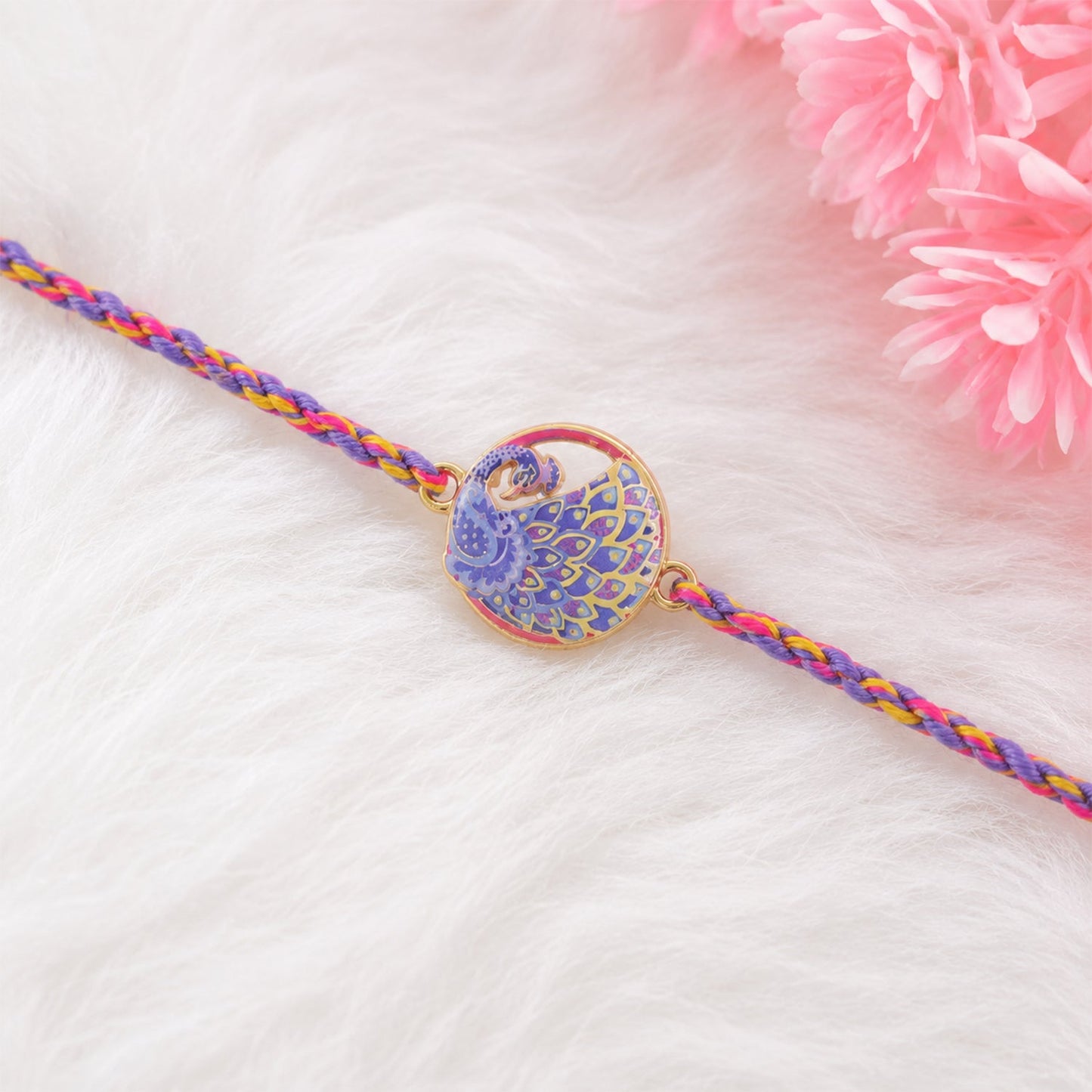 Close-up of peacock design on Fancy Dori Rakhi