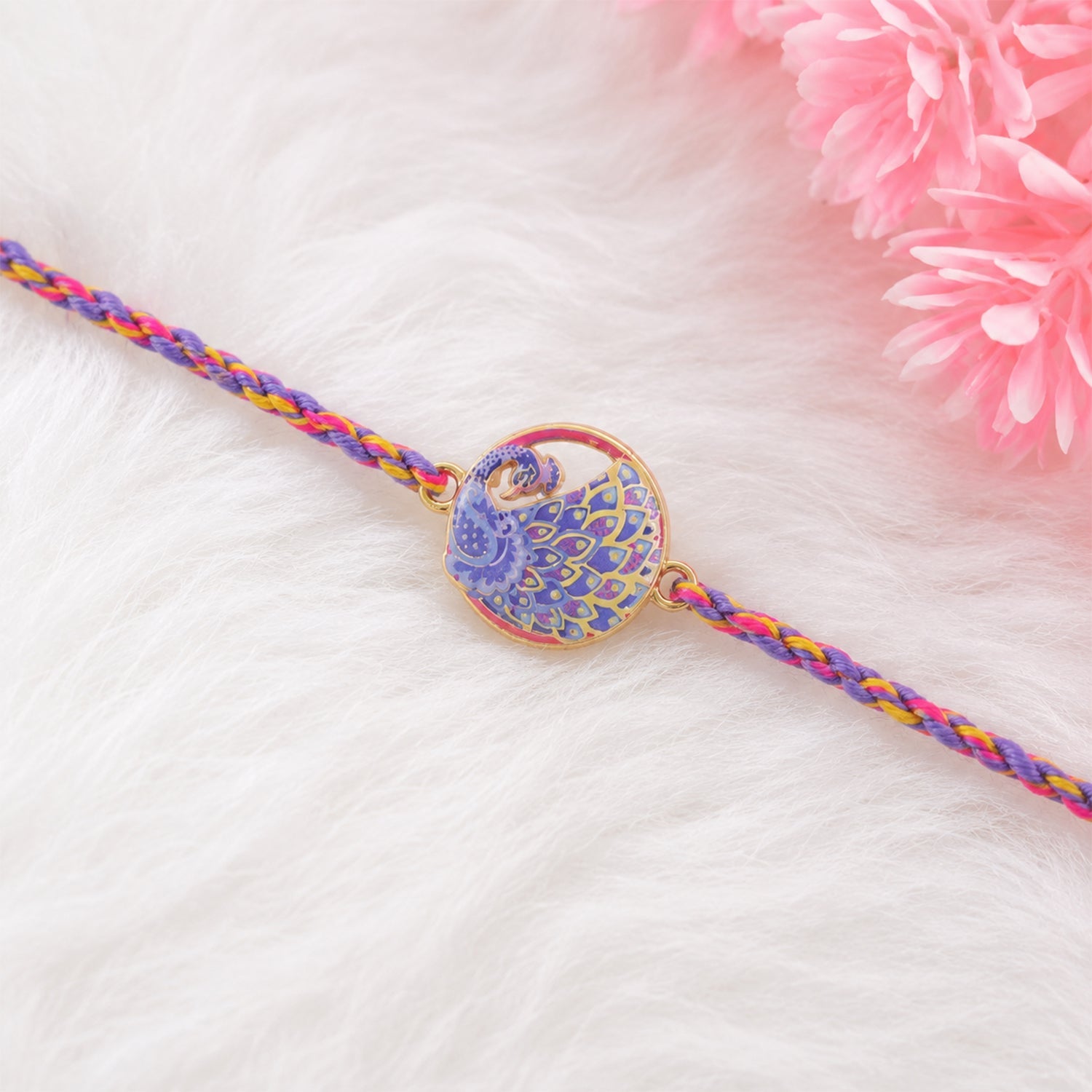 Close-up of peacock design on Fancy Dori Rakhi