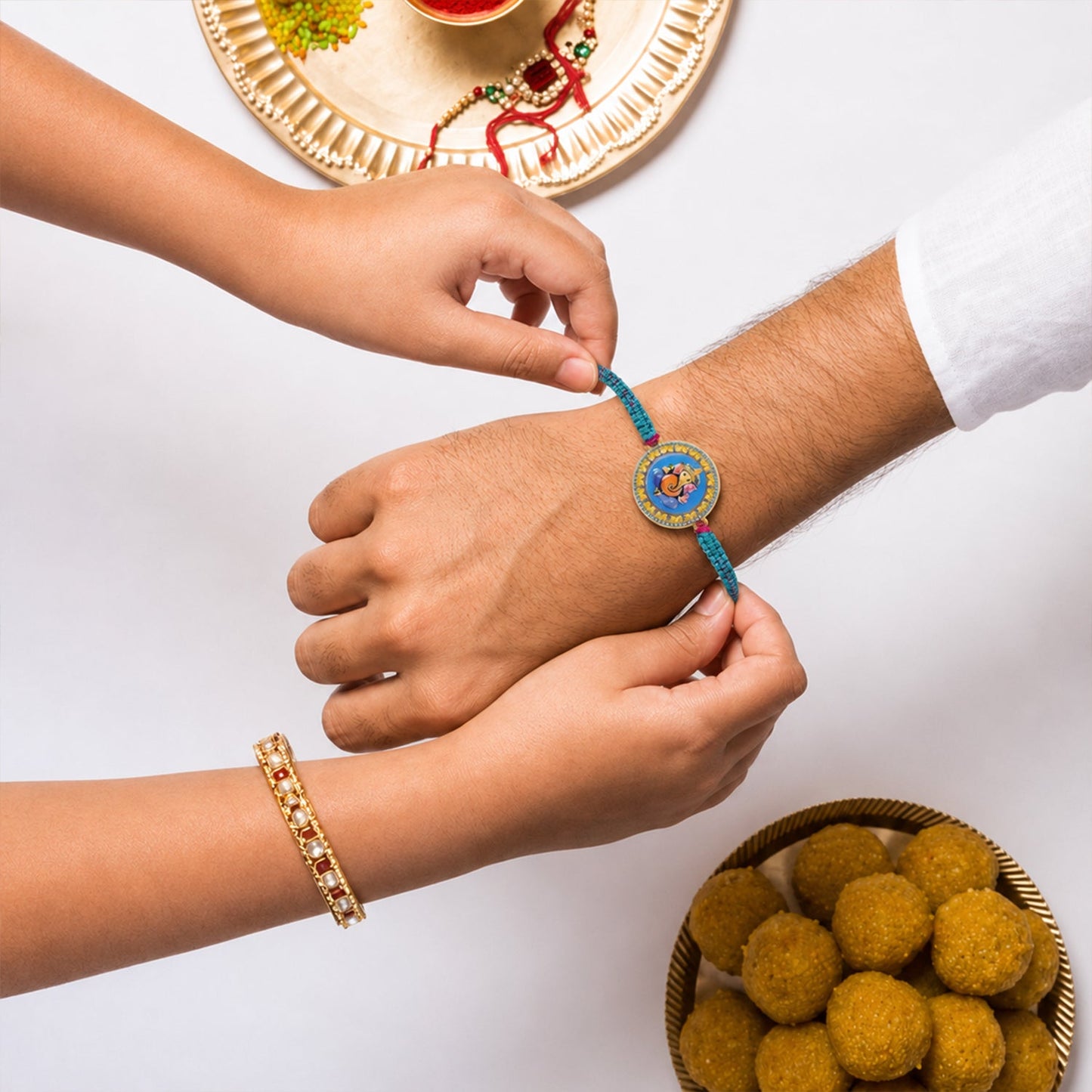 Top view of Ganesh Round Charm Fancy Dori Rakhi