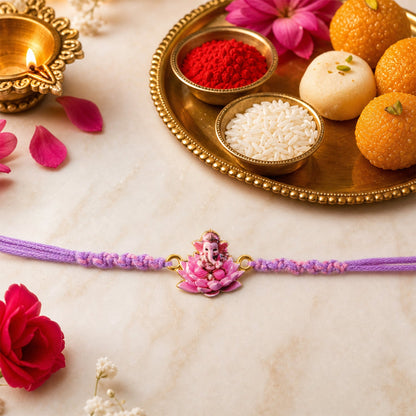 Pink Lotus Ganesh Fancy Dori Rakhi - tied on wrist