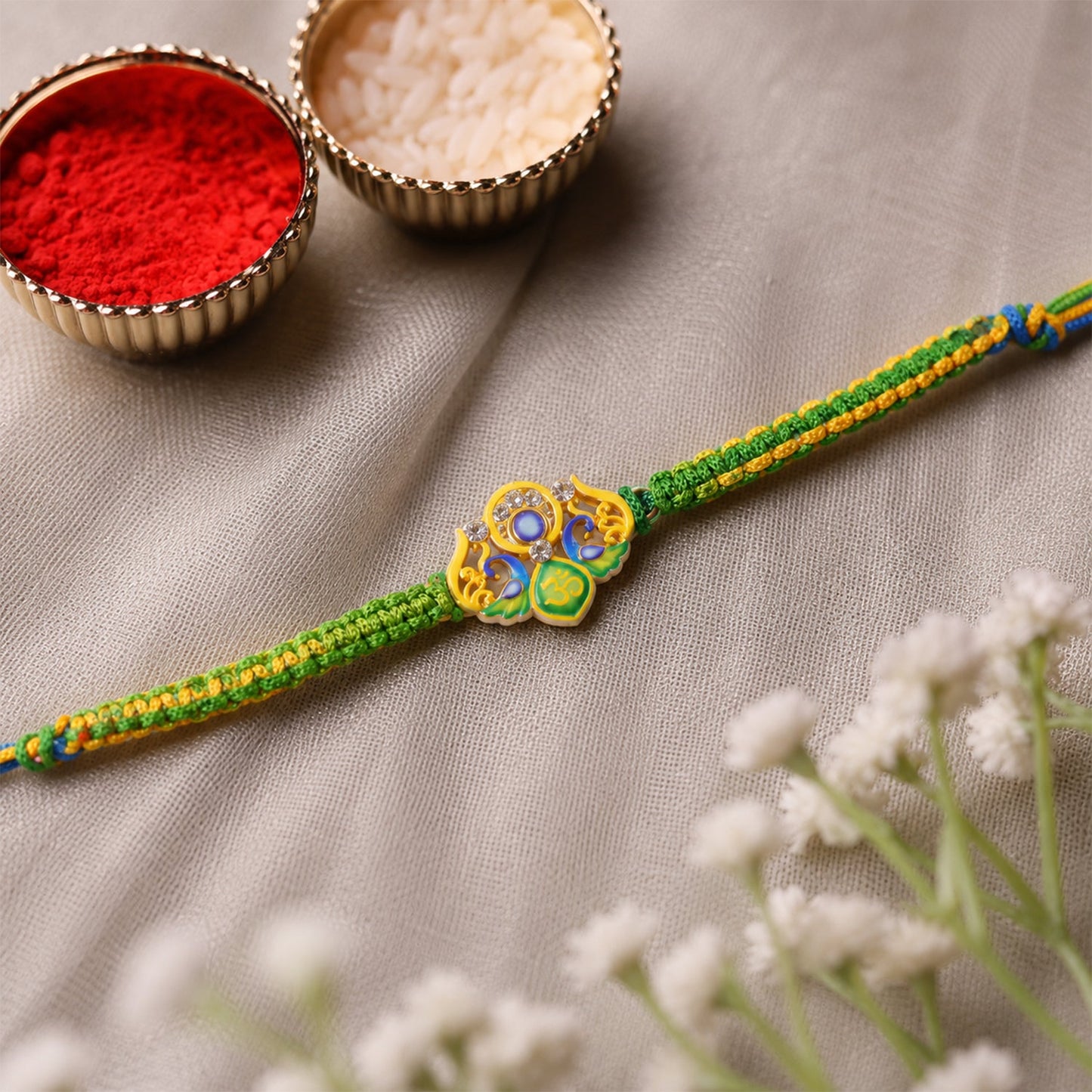 Green Om Peacock Fancy Dori Rakhi side view