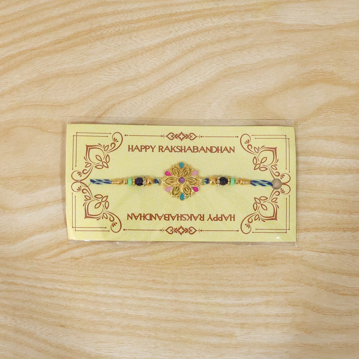 Premium lightweight rakhi featuring floral charm and beads