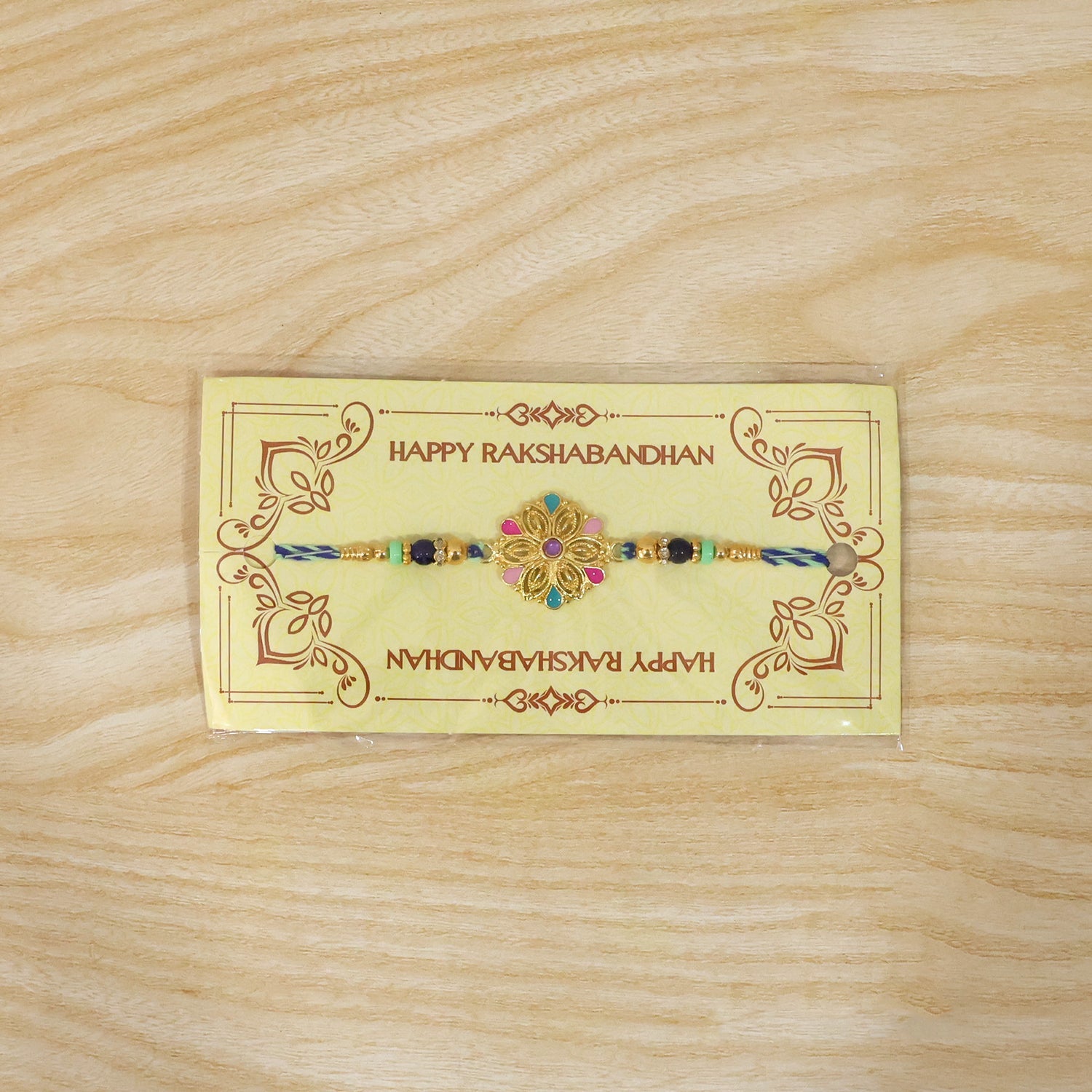 Premium lightweight rakhi featuring floral charm and beads