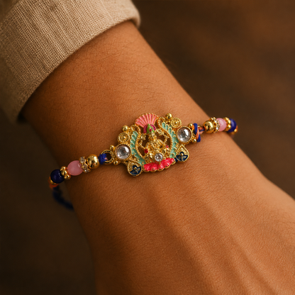 Goddess charm beaded rakhi for brother on white background
