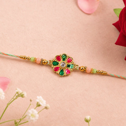 Elegant colorful flower rakhi tied on a thread for brother