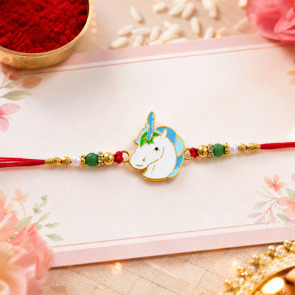 Cute Unicorn Beaded Rakhi displayed on a round platform