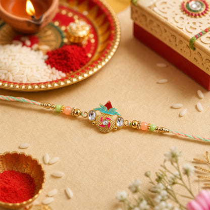 Kalash Kundan Rakhi tied showing decorative charm