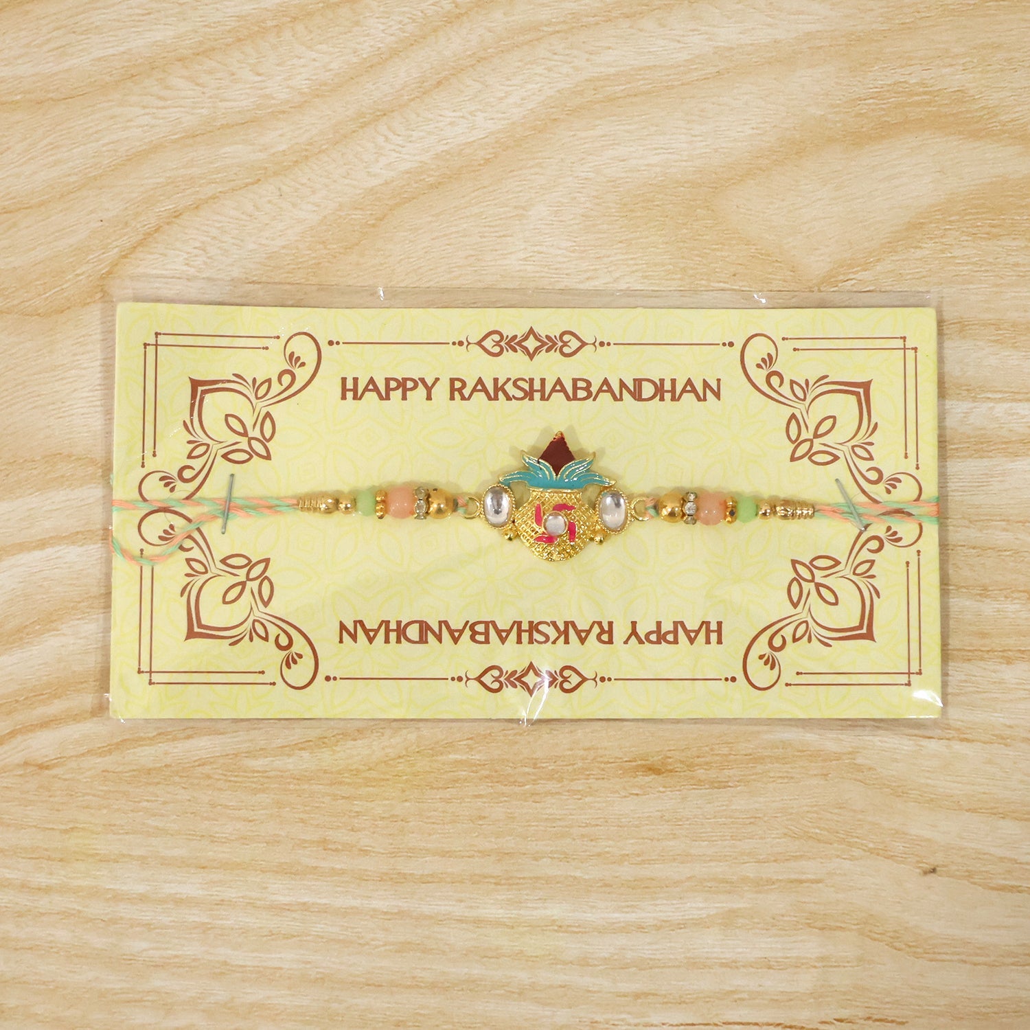 Kalash Kundan Rakhi detailed bead and charm design