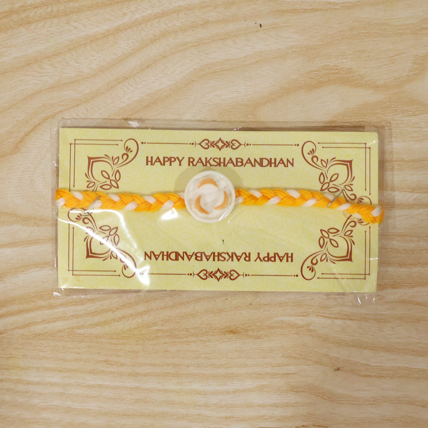 White Round Charm Fancy Dori Rakhi packaging