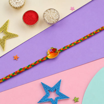 Top view showing colorful thread and design details of rakhi