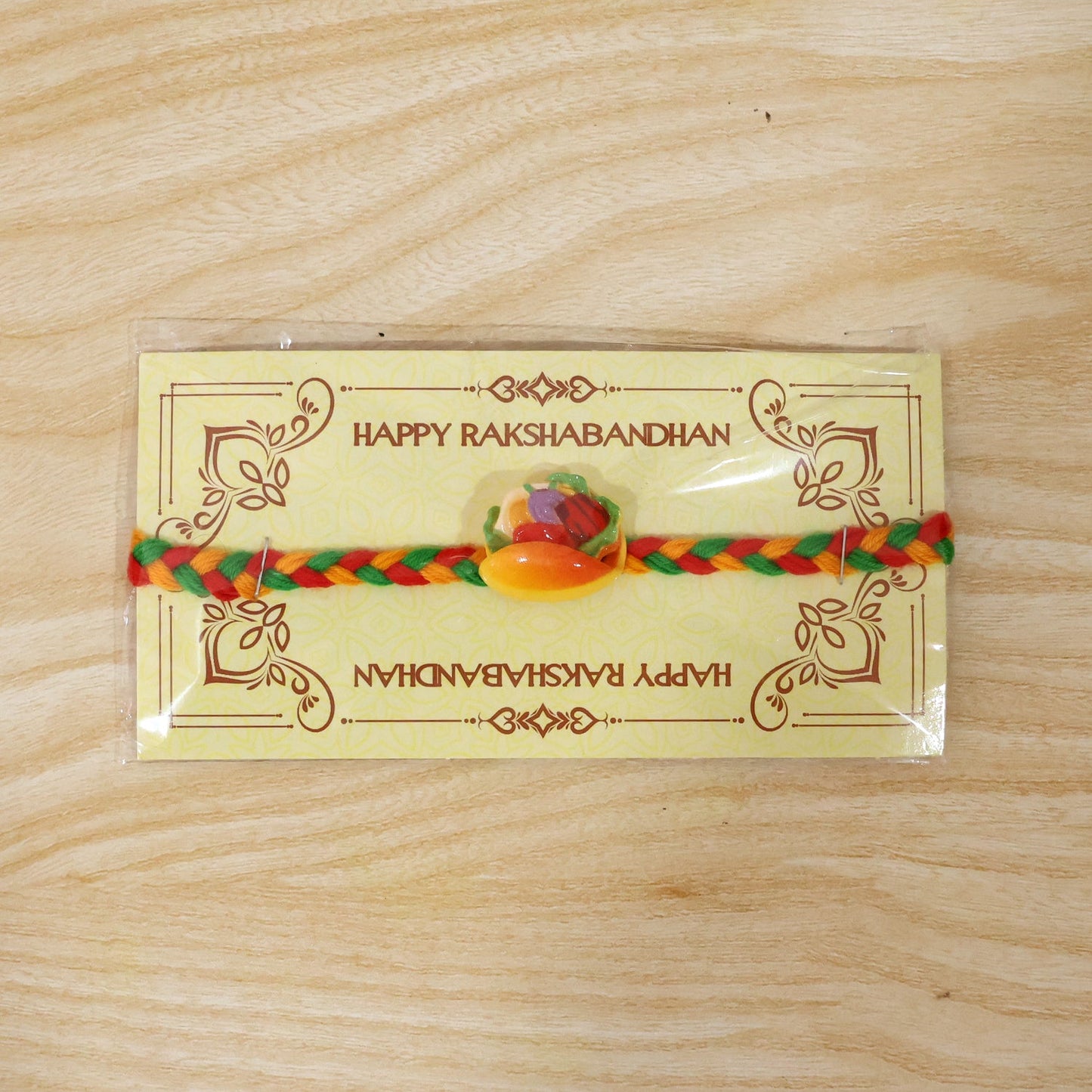 Colorful fruit design rakhi ready to tie on wrist