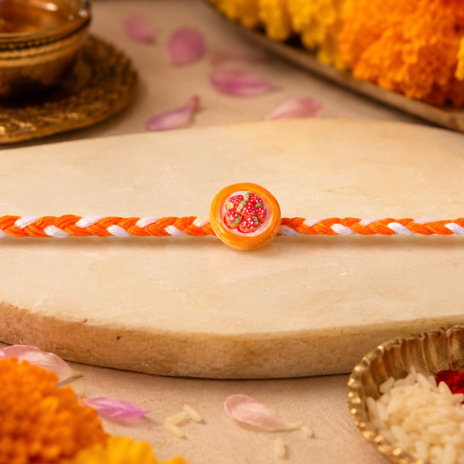 Side angle showing rakhi thread and decorative elements
