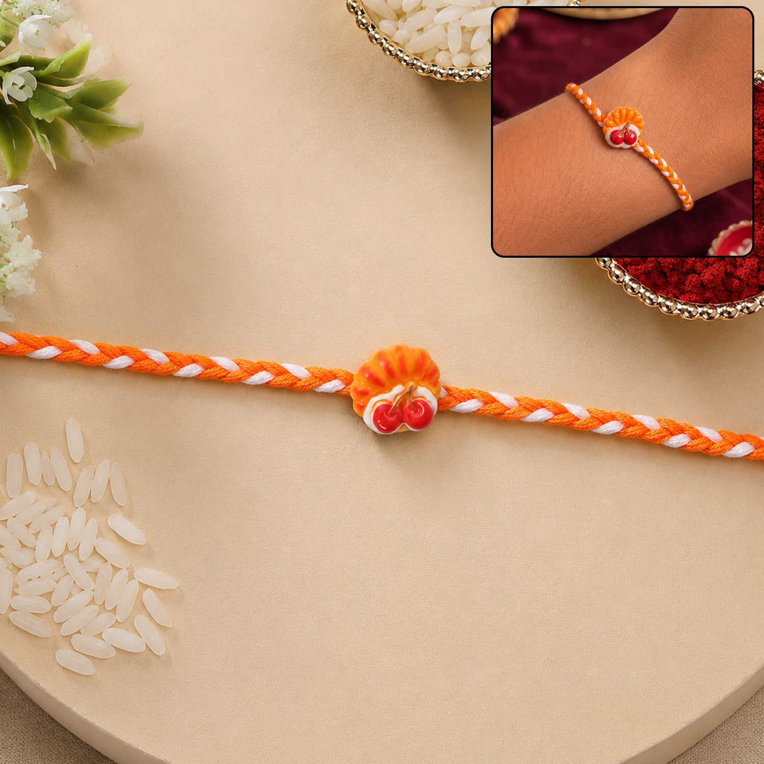 Cherry Pastry Charm Fancy Dori Rakhi front view