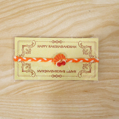 Detailed view of rakhi thread and charm