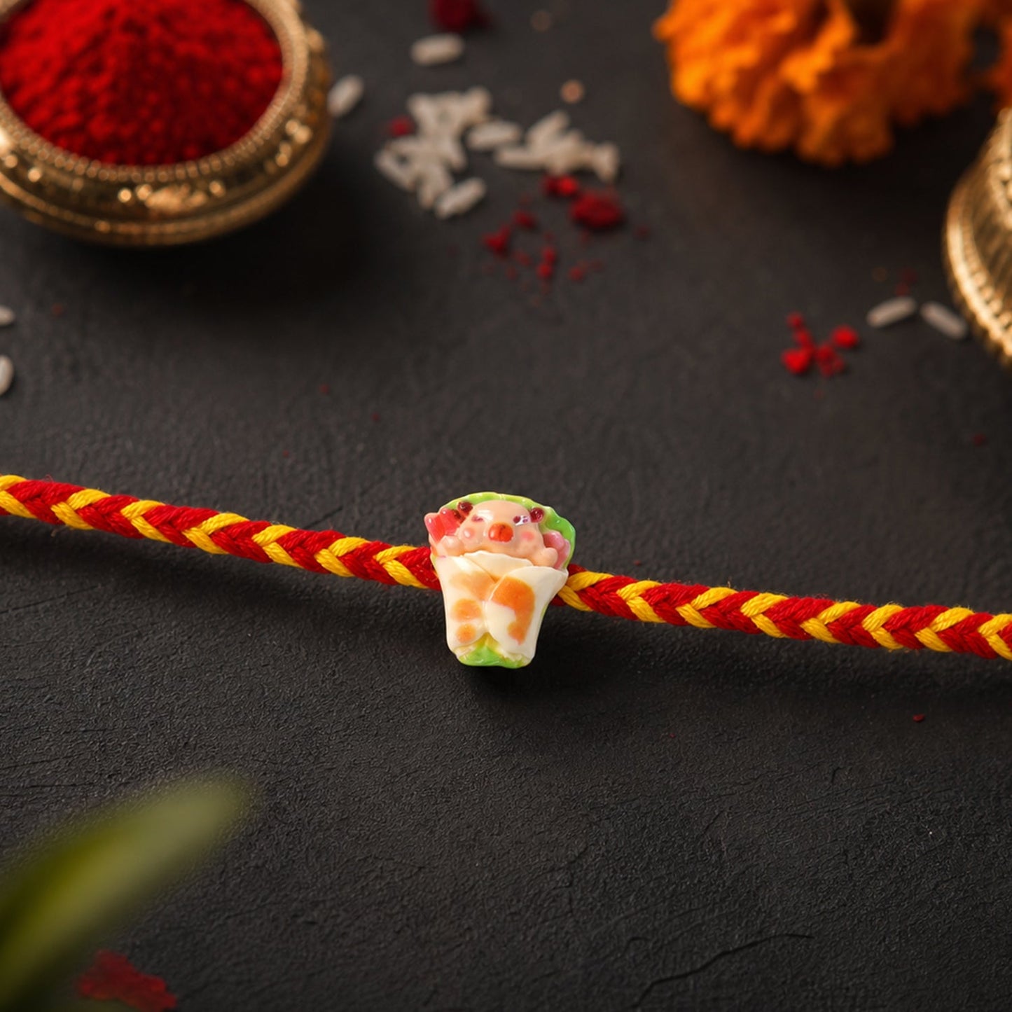 Close-up of designer rakhi showing neat finishing