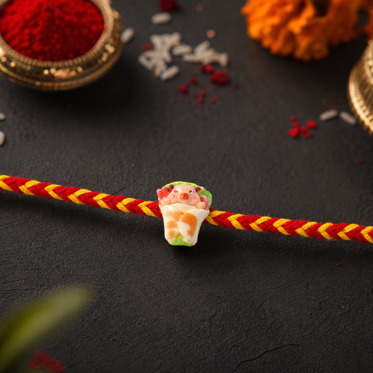 Close-up of designer rakhi showing neat finishing