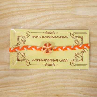 Orange Slice Charm Rakhi packaging display