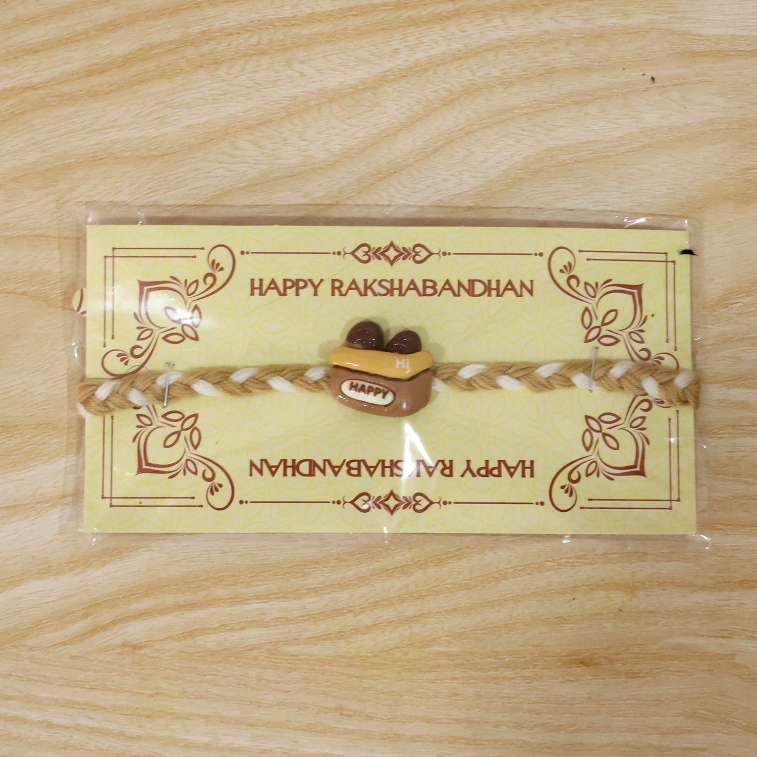 Festive Happy Cup Charm Fancy Dori Rakhi ready to tie