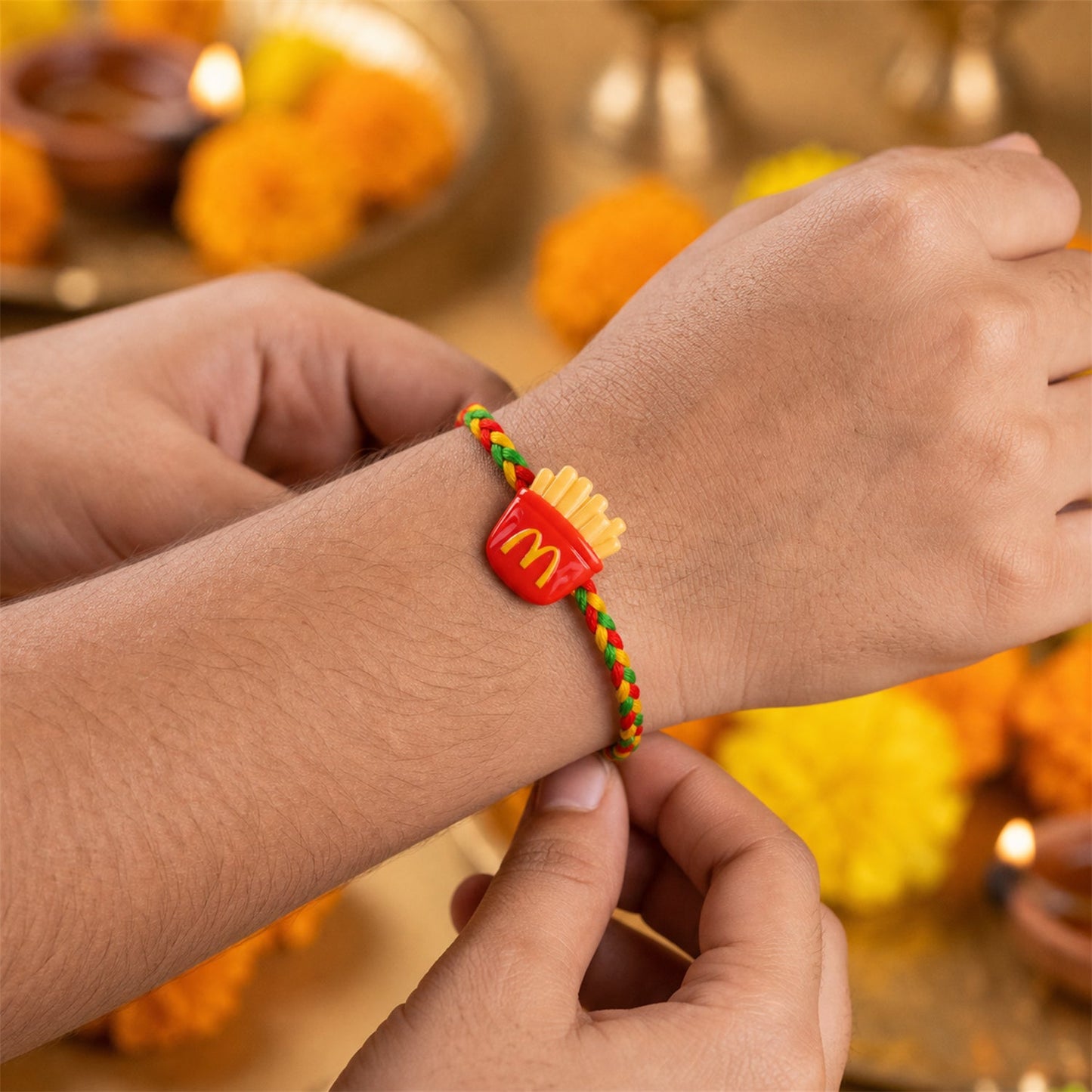 Close-up of French Fries Charm Fancy Dori Rakhi for Brother