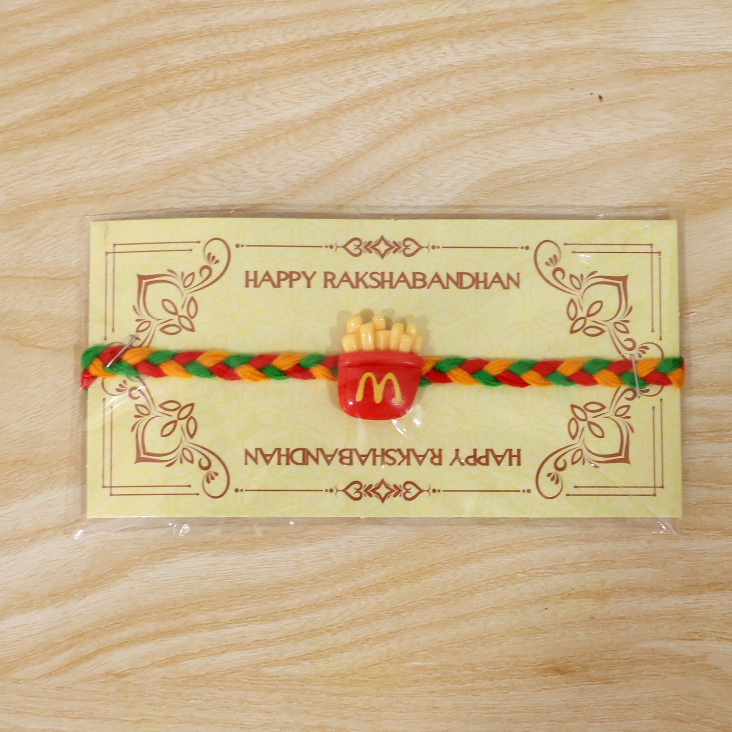 Side view of French Fries Charm designer rakhi for Raksha Bandhan
