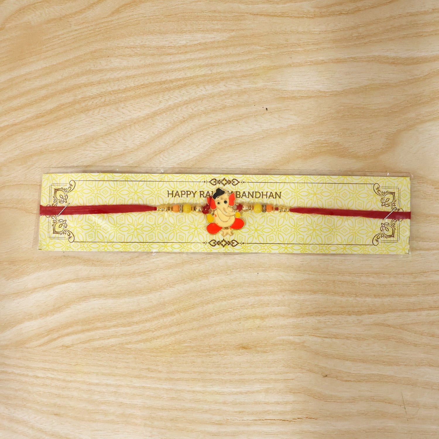 Decorative Divine Idol charm rakhi ready to tie on wrist