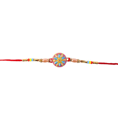 Traditional yet modern colorful rakhi with round charm