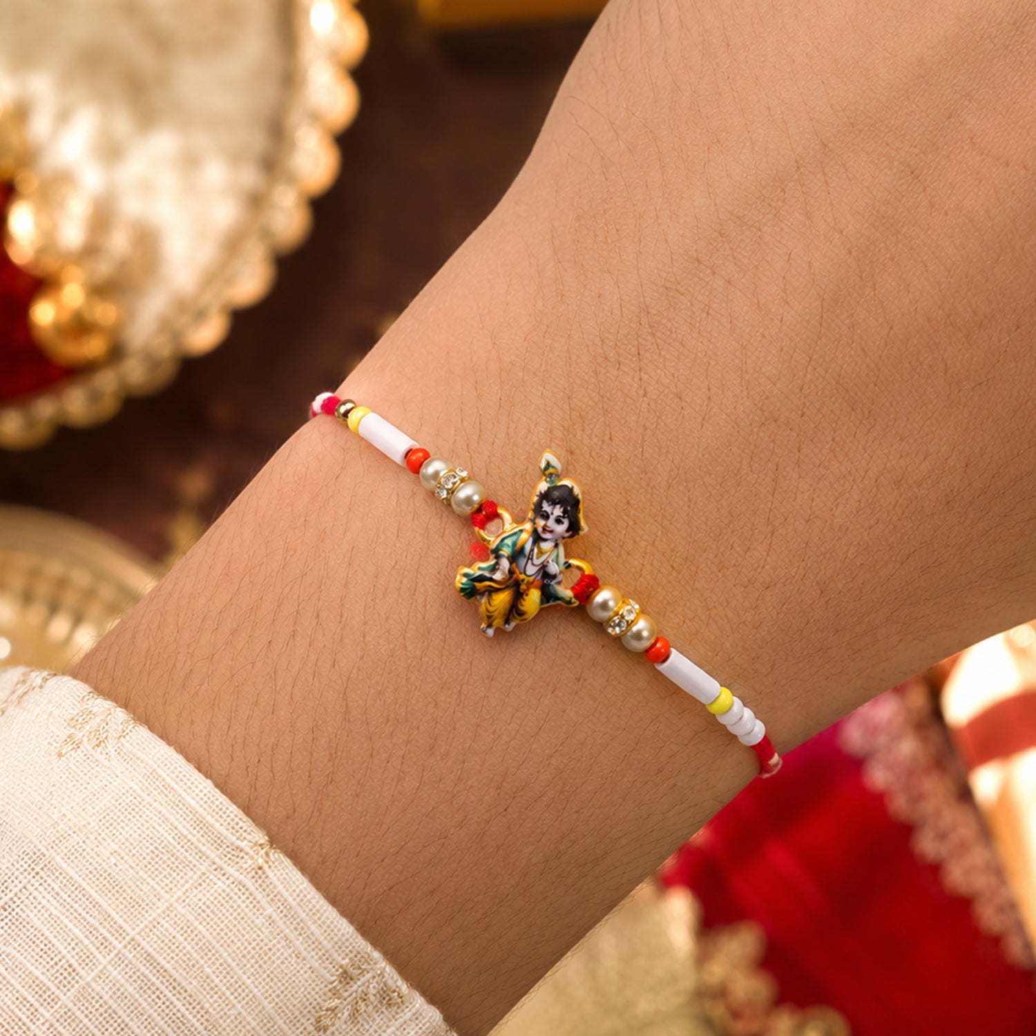 Side view of Krishna Idol Beads Rakhi