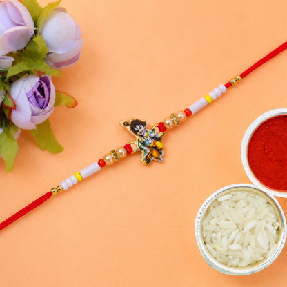 Decorative beads detail on Krishna rakhi