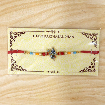 Premium rakhi with Mahadev idol and bead details close up