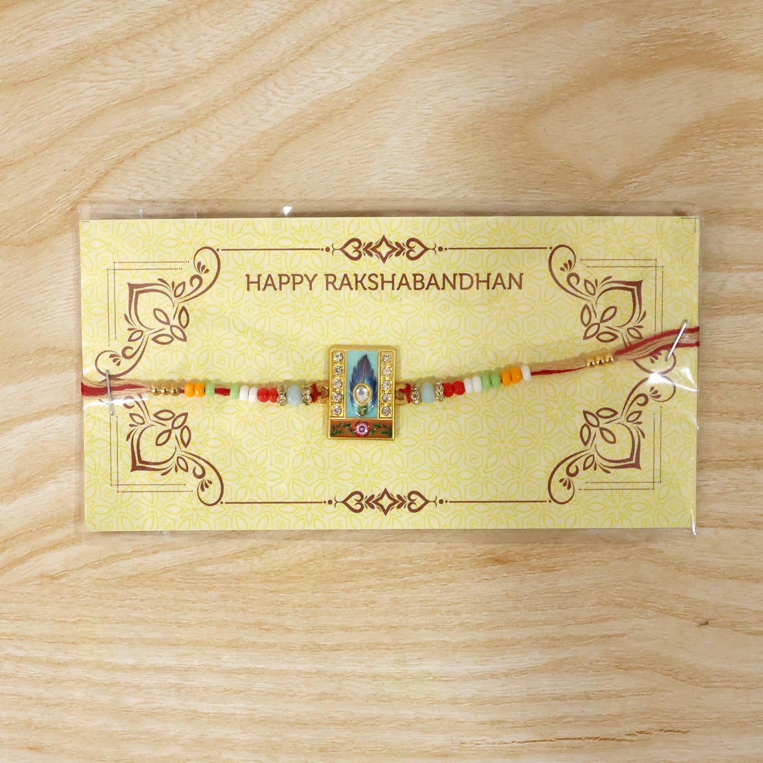 Mor Pankh Square Kundan Charm Rakhi styled for Raksha Bandhan celebration